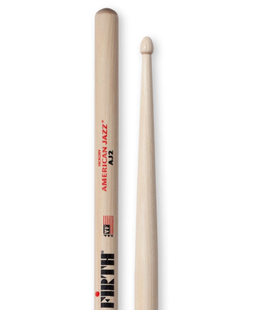 VIC FIRTH VIC-AJ2 ドラムスティック×3セットAMERICAN JAZZアメリカン・ジャズ・シリーズ小さめのティアドロップ(涙)型チップの採用と、ネック部から長めのテーパー形状とすることで、心地よいリバウンド感が得られ、ダークなシンバルサウンドに貢献するモデル。サイズ：14.4×407mm材質：ヒッコリー※3セットでの販売です。