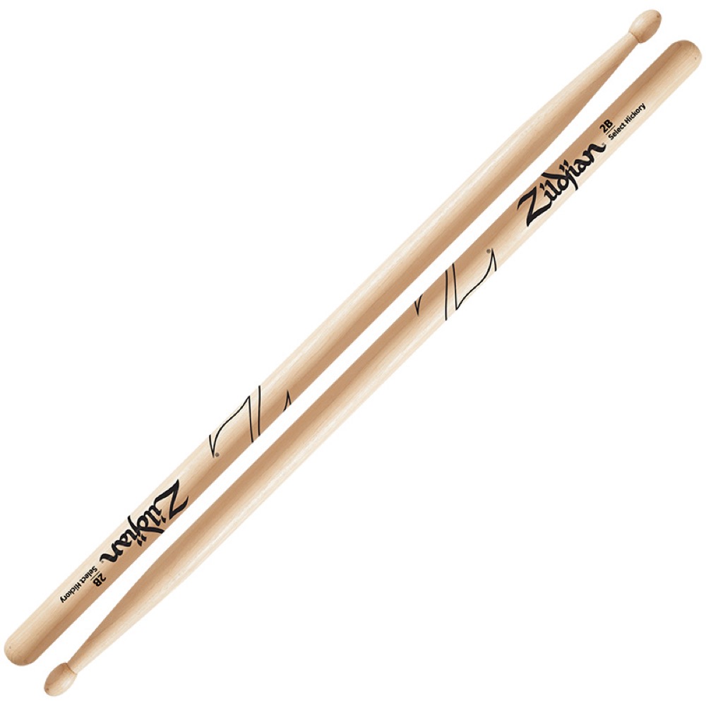 ZILDJIAN LAZLZ2B Hickory Series 2B WOOD NATURAL DRUMSTICK ドラムスティック×3セット。ZILDJIAN LAZLZ2B Hickory Series 2B WOOD NATURAL DRUMSTICK ドラムスティック太めのサイズで楕円形チップを採用しパワーも出しやすく、多目的に使えるスティック。チップはウッドとナイロンを用意。サイズ:406×15.9mmSC：LAZLZ2B材質：ヒッコリーチップ：ウッドカラー：ナチュラル※3セットでの販売です。