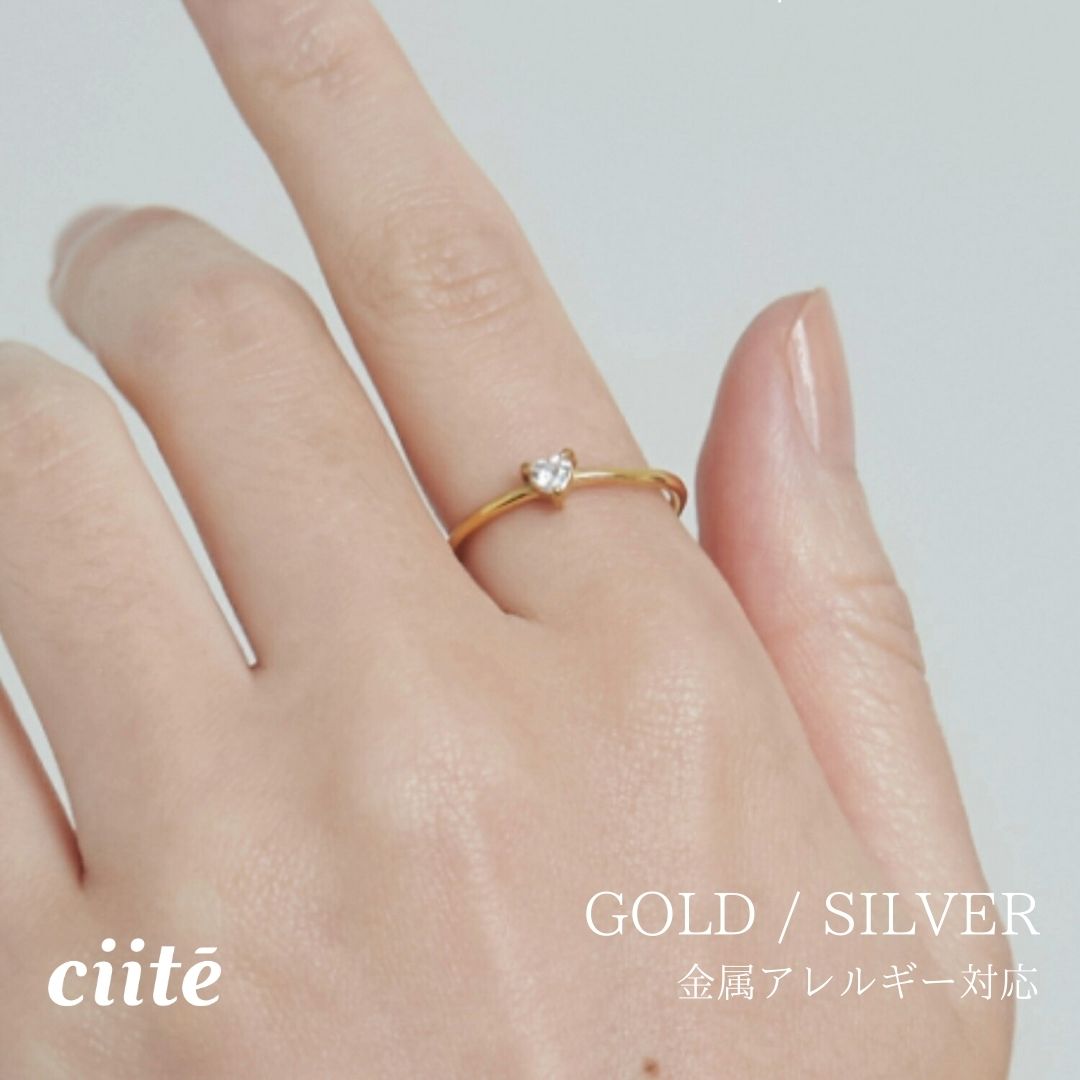 Rakuten - 金属アレルギー対応 トライアングルビジューリング サージカルステンレス レディース アクセサリー 結婚式 パーティー 誕生日 プレゼント シルバー ゴールド ピンクゴールド シンプル