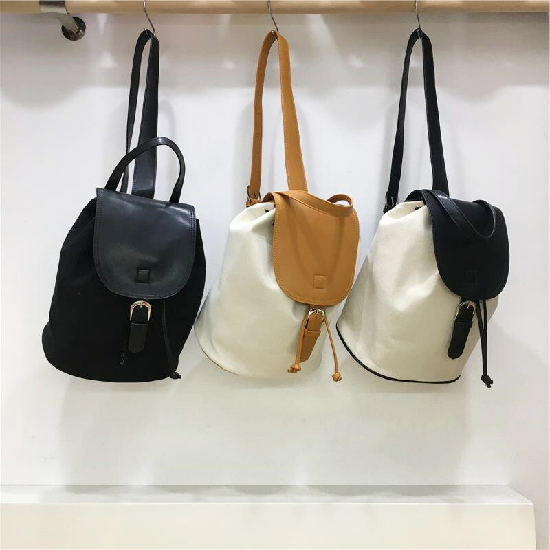 コンビ素材レザーリュック