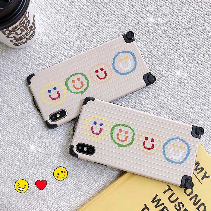 【メール便送料無料】≪人気SMILEシリーズ≫掴みやすいオシャレなラゲージケース風凸凹ボディが大人女子にぴったり♪かわいいにこちゃんが並んだスマホケース iPhone6,6s,6Plus,6 S Plus,iPhone7,8,7Plus,8Plus,iPhoneX,XS,iPhoneXR,iPhoneXS MAX