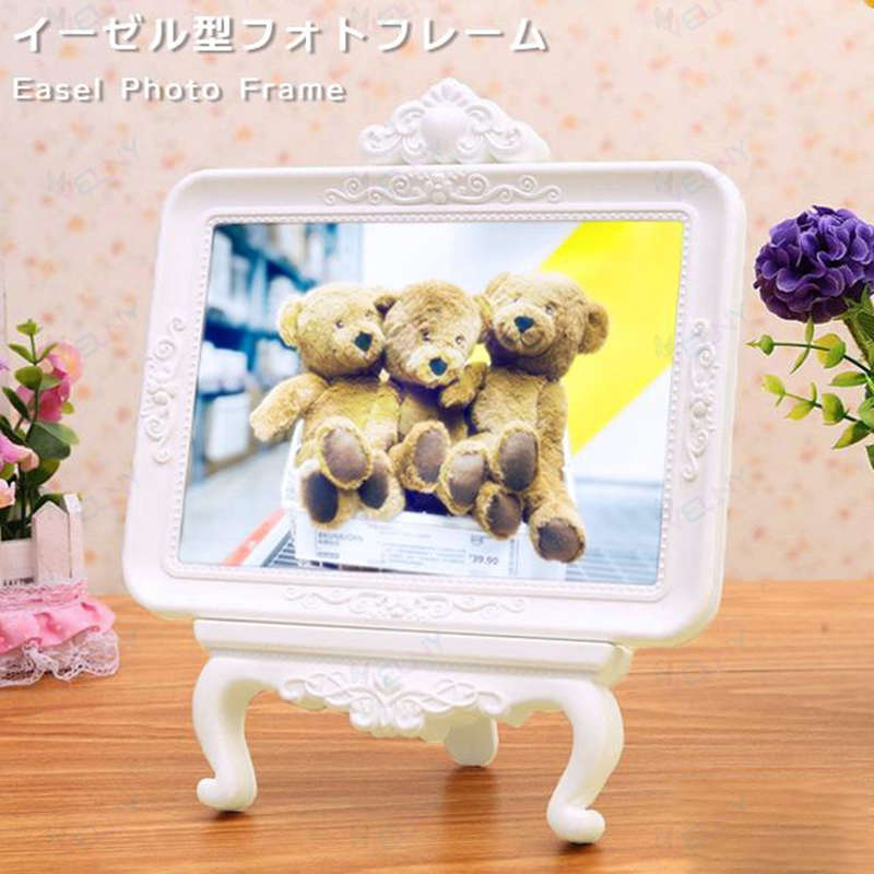 イーゼルのかたちをした可愛い写真立て　＊フォトフレーム/写真立て/写真入れ/L判/KG判/2L判/フォト/写真/フレーム/額/写真たて/イーゼル/イーゼル風/おしゃれ/オシャレ/お洒落/置き型/卓上/ヨコ/横向き/シンプル/ホワイト/白/ナチュラルインテリア/はがき/シンプル/雑貨/インテリア雑貨/子ども/こども/べビー/赤ちゃん/ベビーギフト/アートフレーム/収納/家族写真/2Lサイズ/大きい/大きめ/贈り物/誕生日/バースデー/バースデイ/ハーフバースデー/お祝い/お返し/出産祝い/内祝い/入園祝い/入学祝い/卒園祝い/卒業祝い/子供の日/こどもの日/子どもの日/結婚祝い/節句/初節句/七五三/行事/記念/記念日/思い出/記録/新入学/思い出/推し活/推し/ヲタ活/推しを飾る/プチギフト/装飾/飾り/マンスリーカード/月齢カード/額縁/ベビー用品/赤ちゃん用品/孫/ベビーフレーム/リビングフレーム/敬老の日/おじいちゃん/おばあちゃん/横型/横長/2024＊【スマートフォンでご覧のお客様】サイズ・納期目安などの詳しい情報は「商品情報をもっと見る」をご参考くださいませ。揃えて便利な旅行小物！ キャリーオンバッグ 折りたたみバッグ ネームタグ スーツケースベルト(ワンタッチ) スーツケースベルト(TSA) ステッカー 洗面ポーチ 圧縮袋 その他便利グッズ 絵画制作やディスプレイに使われるイーゼルのようなフォトフレームです。シンプルながらもおしゃれなフォルムで、たくさんの思い出が詰まった写真などを飾ることができます。対応サイズは2L判まで。写真が見える範囲は2Lサイズより少し小さくなります。横からスライドさせて出し入れするタイプです。※スライド時に中で引っ掛かりを感じる場合がございます。※横置きのみで縦置きにはできません。細かい部分の装飾も凝ったデザインとなっているため、そのままインテリアとしてお部屋に飾っても◎【インポート製品について】こちらは海外ブランド基準で検品されたインポート商品です。デザイン性重視の傾向の為、使用上問題のない軽度な色変化（拭き取りにて軽減可能・不可含む）、小さなバリ、擦れや傷などの軽微な難は、通常正規商品として輸入・販売しております。また、スタッフにて検品を行っている場合があるため、商品は一度開封されているものが多くございます。上記注意事項をご了承の上、購入をご検討くださいませ。 品番 gu1c454 サイズ（約） 横19.5×高さ23×奥行9.5cm　※使用時 写真入れ部分（約） 横15.8×縦11cm 重量（約） 236g 材質 プラスチック、ガラス 製造国 中国 ※振込でのお支払いは、ご入金確認後となります。　※土日祝はお休みです。 特記イーゼルのかたちをした可愛い写真立て　＊フォトフレーム/写真立て/写真入れ/L判/KG判/2L判/フォト/写真/フレーム/額/写真たて/イーゼル/イーゼル風/おしゃれ/オシャレ/お洒落/置き型/卓上/ヨコ/横向き/シンプル/ホワイト/白/ナチュラルインテリア/はがき/シンプル/雑貨/インテリア雑貨/子ども/こども/べビー/赤ちゃん/ベビーギフト/アートフレーム/収納/家族写真/2Lサイズ/大きい/大きめ/贈り物/誕生日/バースデー/バースデイ/ハーフバースデー/お祝い/お返し/出産祝い/内祝い/入園祝い/入学祝い/卒園祝い/卒業祝い/子供の日/こどもの日/子どもの日/結婚祝い/節句/初節句/七五三/行事/記念/記念日/思い出/記録/新入学/思い出/推し活/推し/ヲタ活/推しを飾る/プチギフト/装飾/飾り/マンスリーカード/月齢カード/額縁/ベビー用品/赤ちゃん用品/孫/ベビーフレーム/リビングフレーム/敬老の日/おじいちゃん/おばあちゃん/横型/横長/2024＊【スマートフォンでご覧のお客様】サイズ・納期目安などの詳しい情報は「商品情報をもっと見る」をご参考くださいませ。揃えて便利な旅行小物！ キャリーオンバッグ 折りたたみバッグ ネームタグ スーツケースベルト(ワンタッチ) スーツケースベルト(TSA) ステッカー 洗面ポーチ 圧縮袋 その他便利グッズ 絵画制作やディスプレイに使われるイーゼルのようなフォトフレームです。シンプルながらもおしゃれなフォルムで、たくさんの思い出が詰まった写真などを飾ることができます。対応サイズは2L判まで。写真が見える範囲は2Lサイズより少し小さくなります。横からスライドさせて出し入れするタイプです。※スライド時に中で引っ掛かりを感じる場合がございます。※横置きのみで縦置きにはできません。細かい部分の装飾も凝ったデザインとなっているため、そのままインテリアとしてお部屋に飾っても◎【インポート製品について】こちらは海外ブランド基準で検品されたインポート商品です。デザイン性重視の傾向の為、使用上問題のない軽度な色変化（拭き取りにて軽減可能・不可含む）、小さなバリ、擦れや傷などの軽微な難は、通常正規商品として輸入・販売しております。また、スタッフにて検品を行っている場合があるため、商品は一度開封されているものが多くございます。上記注意事項をご了承の上、購入をご検討くださいませ。 品番 gu1c454 サイズ（約） 横19.5×高さ23×奥行9.5cm　※使用時 写真入れ部分（約） 横15.8×縦11cm 重量（約） 236g 材質 プラスチック、ガラス 製造国 中国 ※振込でのお支払いは、ご入金確認後となります。　※土日祝はお休みです。 特記
