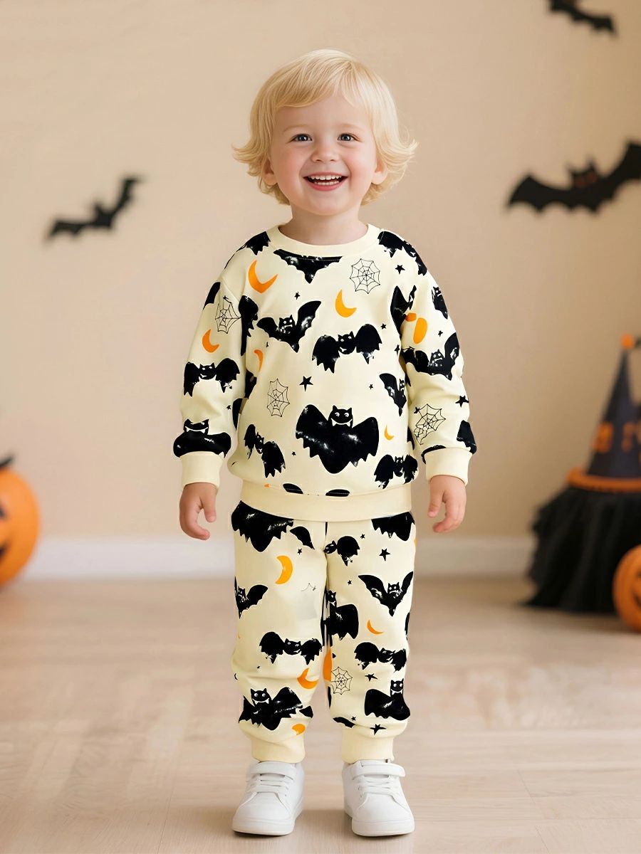 商品説明商品名ベビー用ハロウィン仕様のセットアップ ハロウィンデザインの長袖トップスと長ズボンのセットです。 ハロウィン以外にも着られてお勧めです。 そんな時に着脱しやすい、ウエスト部分に伸縮性があるゴムだと便利かなと思います。 お家用、お出かけ用両方で活用できます！ Babyと一緒に今だけの『カワイイ』を楽しみましょう！ 素材綿・ポリエステル 生産国中国サイズ 0-6M(70) 　着丈30cm　バスト52cm　ズボン丈38cm　ウエスト36cm　 6-12M(80)　着丈34cm　バスト54cm　ズボン丈41cm　ウエスト38cm　 12-18M(90)　着丈36cm　バスト56cm　ズボン丈44cm　ウエスト40cm　 18-24M(100)　着丈38cm　バスト59cm　ズボン丈47cm　ウエスト42cm　 2-3Y(110)　着丈40cm　バスト62cm　ズボン丈51cm　ウエスト44cm カラー：コウモリ (90) 　着丈41cm　バスト63cm　ズボン丈53cm　ウエスト42cm　 (100) 　着丈43cm　バスト66cm　ズボン丈56.5cm　ウエスト44cm　 (110) 　着丈45cm　バスト69cm　ズボン丈60cm　ウエスト46cm　 (115) 　着丈47cm　バスト72cm　ズボン丈64.5cm　ウエスト48cm　 (120) 　着丈49cm　バスト75cm　ズボン丈69cm　ウエスト50cm　 (125) 　着丈51cm　バスト78cm　ズボン丈73.5cm　ウエスト52cm　 セット内容 トップス＋ボトムス 注意 PC環境・光の具合により、色や素材のイメージが写真と若干異なる場合がございます。 モデル・写真に使用されているアクセサリー・小物は別途記載が無い限り付属いたしません。 商品に不良があった場合は、商品到着から5日以内にご連絡いただければご返金・交換対応させて頂きます。 商品のサイズは、全て平置きにて外寸を測定しております。 商品によっては+-0.5cm〜1cmの誤差が発生してしまう場合がございます。 該当商品は他店と在庫共有です。タイミングにより、在庫ズレが生じる場合がございます。予めご了承ください。商品説明商品名ベビー用ハロウィン仕様のセットアップ ハロウィンデザインの長袖トップスと長ズボンのセットです。 ハロウィン以外にも着られてお勧めです。 そんな時に着脱しやすい、ウエスト部分に伸縮性があるゴムだと便利かなと思います。 お家用、お出かけ用両方で活用できます！ Babyと一緒に今だけの『カワイイ』を楽しみましょう！ 素材綿・ポリエステル 生産国中国サイズ 0-6M(70) 　着丈30cm　バスト52cm　ズボン丈38cm　ウエスト36cm　 6-12M(80)　着丈34cm　バスト54cm　ズボン丈41cm　ウエスト38cm　 12-18M(90)　着丈36cm　バスト56cm　ズボン丈44cm　ウエスト40cm　 18-24M(100)　着丈38cm　バスト59cm　ズボン丈47cm　ウエスト42cm　 2-3Y(110)　着丈40cm　バスト62cm　ズボン丈51cm　ウエスト44cm カラー：コウモリ (90) 　着丈41cm　バスト63cm　ズボン丈53cm　ウエスト42cm　 (100) 　着丈43cm　バスト66cm　ズボン丈56.5cm　ウエスト44cm　 (110) 　着丈45cm　バスト69cm　ズボン丈60cm　ウエスト46cm　 (115) 　着丈47cm　バスト72cm　ズボン丈64.5cm　ウエスト48cm　 (120) 　着丈49cm　バスト75cm　ズボン丈69cm　ウエスト50cm　 (125) 　着丈51cm　バスト78cm　ズボン丈73.5cm　ウエスト52cm　 セット内容 トップス＋ボトムス 注意 PC環境・光の具合により、色や素材のイメージが写真と若干異なる場合がございます。 モデル・写真に使用されているアクセサリー・小物は別途記載が無い限り付属いたしません。 商品に不良があった場合は、商品到着から5日以内にご連絡いただければご返金・交換対応させて頂きます。 商品のサイズは、全て平置きにて外寸を測定しております。 商品によっては+-0.5cm〜1cmの誤差が発生してしまう場合がございます。 該当商品は他店と在庫共有です。タイミングにより、在庫ズレが生じる場合がございます。予めご了承ください。