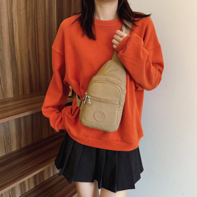ボディバッグ レディース 大容量 軽量 布製 カジュアル スマホポーチ 通勤 斜めがけ 鞄 シンプル 無地 ..