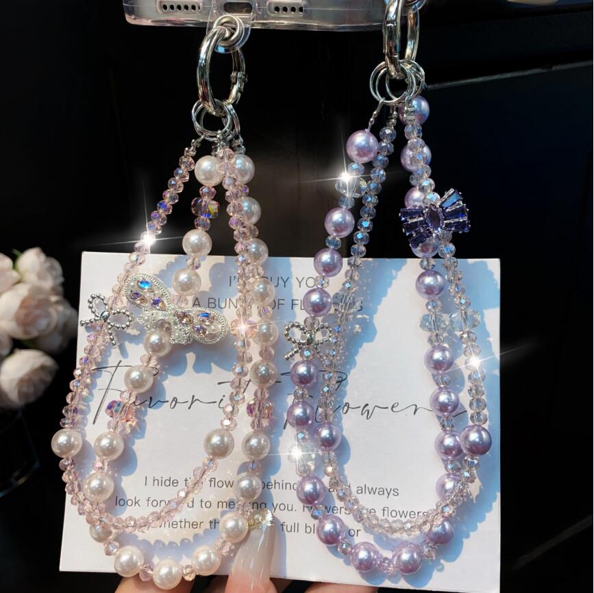 スワロフスキー リボン 蝶ネクタイ ダブルチェーン スマホストラップ ビーズ パール クリスタル 携帯飾り アクセサリー レディース 上品 おしゃれ 高級感 車内インテリア ギフトSamsung iPhone Googleアイフォン用【インスタ映え】