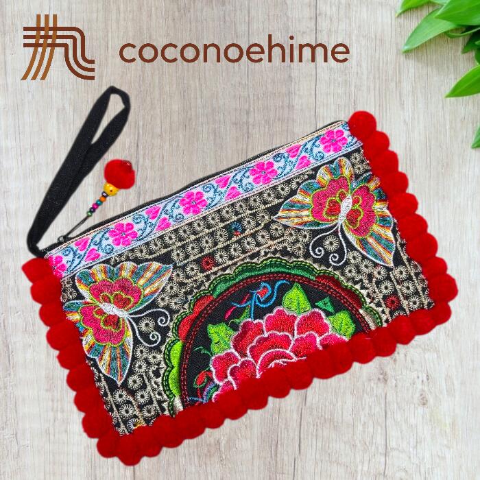Rakuten - 色鮮やかな刺繍のポンポンポーチ☆レッドカラーモン族 刺繍 フラワー刺繍 チョウ刺繍 ポンポン ポーチ　バッグ 小物入れ 撮影 小道具 普段使い プレゼント カラフル ラッキーカラー 色鮮やか 美しい 可愛い ファッション エスニック アジアン雑貨 輸入雑貨