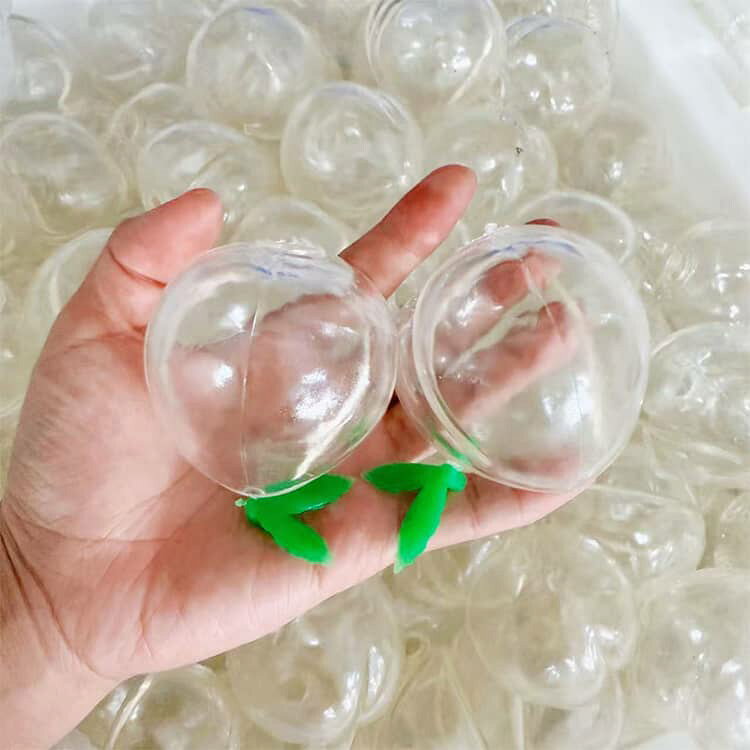 TPR素材 スクイーズの皮 もちもち ぷにぷに DIYスクイーズ フルーツモチーフ ジェル 手作りスクイーズキット 透明タイプ 桃型 9個セット 感触おもちゃ 中身を入れて作れる オリジナルスクイーズ制作 9個セット ビーズ ラメ対応 ハンドメイド素材 握る玩具 coconut1992-10004779 ココナッツカンパニー サンプル画像2