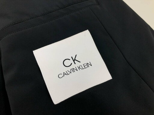 美品【シーケーカルバンクライン】 ナイロンストレッチ 2B段返りセットアップスーツ (メンズ) size3L ブラック 墨黒 無地 ◇33RMS1754◇ 【中古】