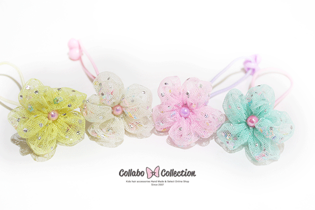 お花　直径3cm カップ付きヘアゴム太さ約2mm ◎ご注意◎ パーツデザインにつきまして海外製品の為、多少塗装の雑な面がございます。ご了承下さいませ。*画像につきましてなるべく実際のカラーに近づくよう撮影しておりますが、若干誤差が生じております！ご了承くださいませ。