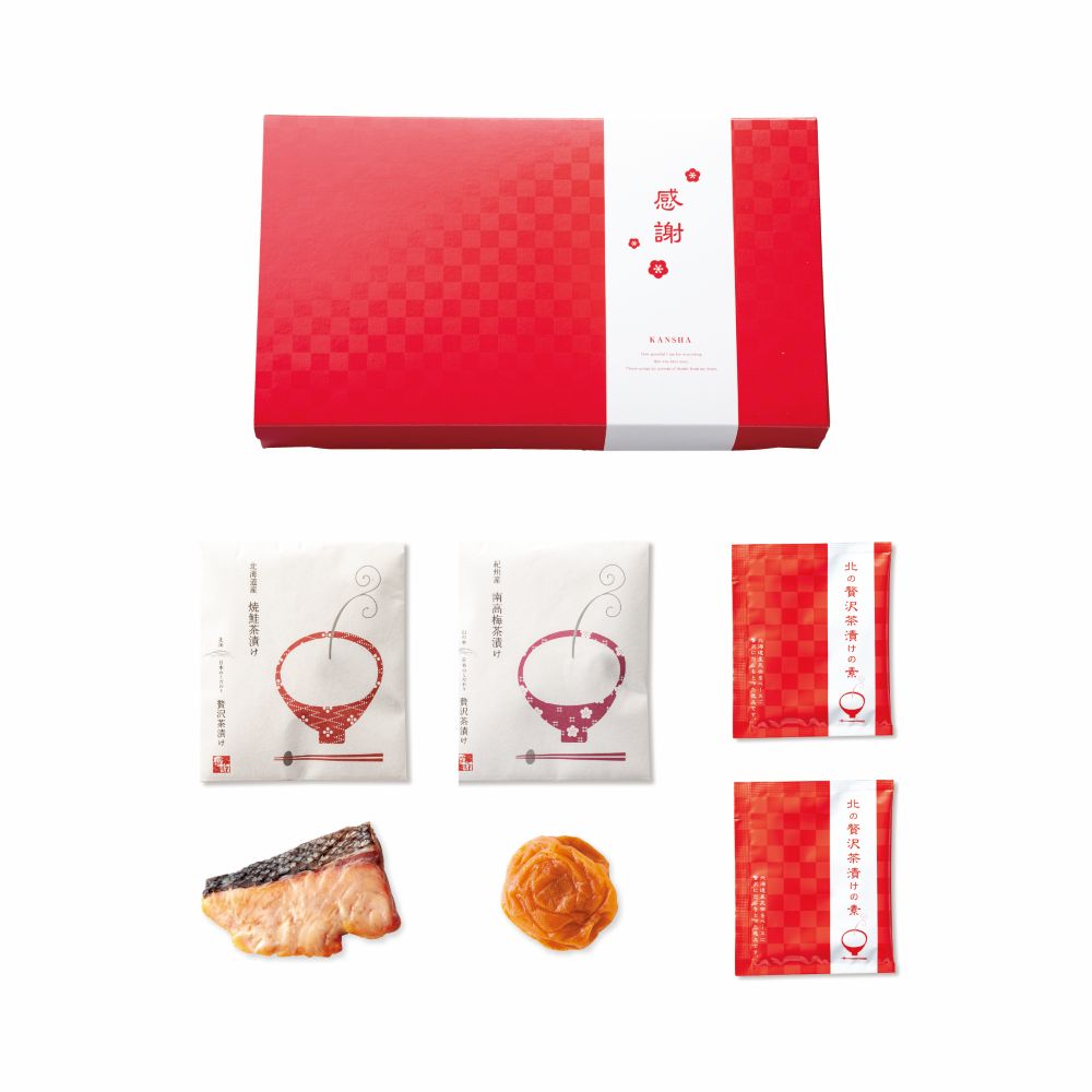 【Box size】155×267×40mm 【商品内容】鮭(レトルト)×1、紀州南高梅×1、贅沢茶漬けの素5g×2 【アレルゲン】ー 【賞味期限】2ヵ月 ※ギフトパッケージで仕上げております。熨斗・包装は省かせていただきます。予めご了承くださいませ。※ご注文は、納品の2週間前までにお願いいたします。 お店で味わうような本格的なお茶漬けをご家庭で。 様々なギフトアイテムをご用意しております。 プチギフト かわいい お菓子 退職 結婚式 二次会 結婚祝い 産休 御礼 個包装 おしゃれ ウェディングギフト 引き出物 引出物 ギフト 内祝食品 ギフト 逸品茶漬け 鮭＆梅干しC　 結婚式 二次会 産休 退職 御礼 ウェディング 引出物 引菓子 プラスワンギフト お茶漬け
