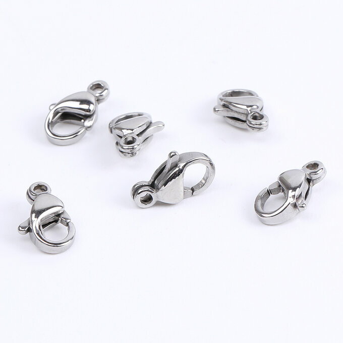 仕　様 サイズ約5×9mm材　質ステンレス製 重さ約2.8g/袋「※アレルギー対応ではありません」 入　数 10ヶ 注意事項 商品の一部には、生産過程上において、歪み・メッキムラ・色ムラ・サビ・多少の柄ずれなどある場合があります。ご返品とご交換は出来かねますので、予めご了承の上ご購入ください。ご理解・ご協力をお願い申し上げます。