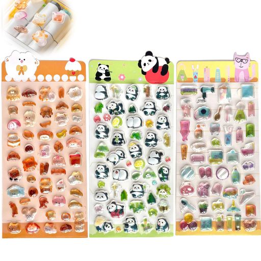 【セット内容】:3Dぷっくりシールは便利な3袋セットで、立体的なエンボスシールがたっぷり入っています。可愛いデザインが豊富で、透明感のあるエポキシ素材を採用し、水滴のようなツヤと立体感が特徴です。人気のステッカーブック作りにも最適な可愛いデコレーションアイテムです。 【デザイン】:この3Dぷっくりシールは猫、うさぎ、ペンギン、おばけ、パンダなど、さまざまなキャラクターやイラストがセットになっています。立体シールは光を受けてキラキラ輝き、手帳・日記・スマホケースなどを華やかに演出します。オリジナル作品づくりにもぴったりです。 【使いやすさ】:すべての3Dぷくぷくシールかわいいには中程度の粘着力があり、滑らかな面や凹凸のある手帳ページにも簡単に貼れます。剥がしても跡が残りにくく、繰り返し使えるタイプなので安心して楽しめます。さまざまな創作シーンに適しています。 【多用途】:多彩なスタイルの3Dぷくぷくシールは、手帳、日記、スクラップブック、アルバム、文房具、スマホケース、水筒など多用途に活躍します。DIYやプレゼントにも最適で、日常のデコレーションや制作物に可愛いアクセントと楽しさを加えてくれます。