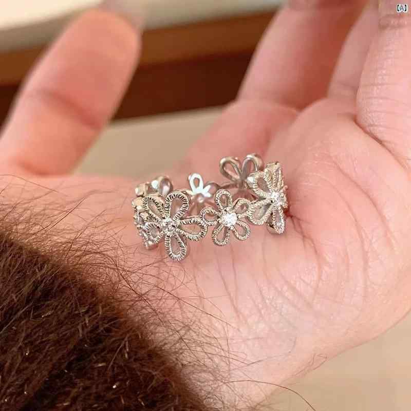 レディース 指輪 花モチーフ 透かし彫り ジルコニア レース かわいい ファッション...
