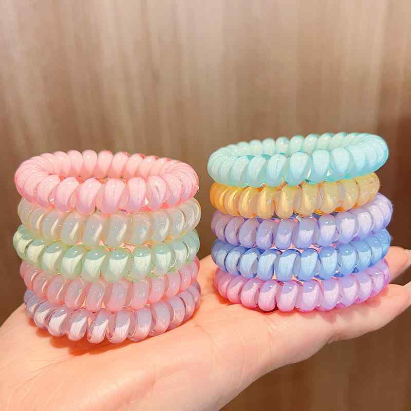 乐天商城 - ヘアゴム 女性用 透明 ジェリーカラー コード状 伸縮性 ポニーテール リストバンド 普段使い カジュアル ヘアアクセサリー