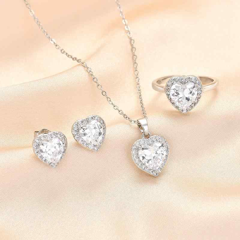 Necklace, Ring, and Earrings Set for Women - A stylish and elegant accessory set featuring a zirconia heart-shaped clavicle chain. The simple yet cute design in silver is sophisticated and elegant, making it a perfect gift for special occasions, parties, everyday wear, weddings, and after-parties.