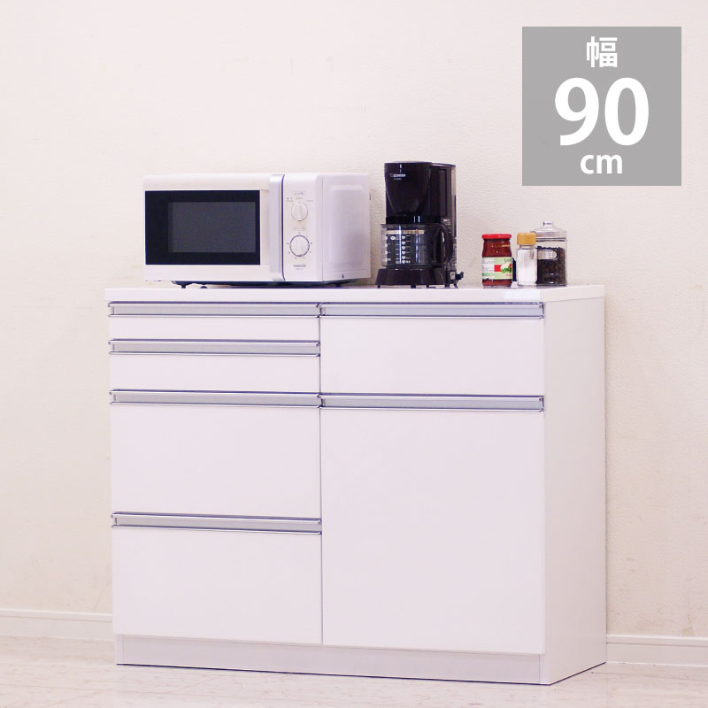 樂天商城 - 【楽天スーパーSALE 5％offクーポン配布中】キッチンカウンター 90 幅90 電子レンジ台 高さ85 食器棚 キッチン収納 間仕切り キッチンボード キャビネット 作業台 対面カウンター 引き出し 収納 ラック おしゃれ ホワイト 艶 大容量 白 清潔感 シンプル 完成品