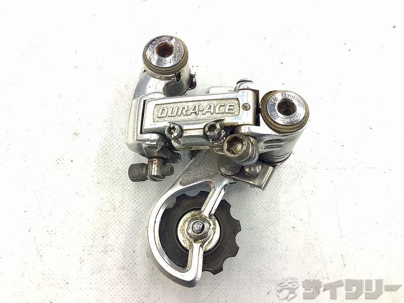 製品情報カテゴリドライブトレイン リアディレイラー メーカーシマノ年式-色状態ランクV(ビンテージ)送料サイズ小型サイズパーツ対応段数：5/6s状態コメント中古品でございます。使用に伴う傷、使用感がございます。その他SHIMANO