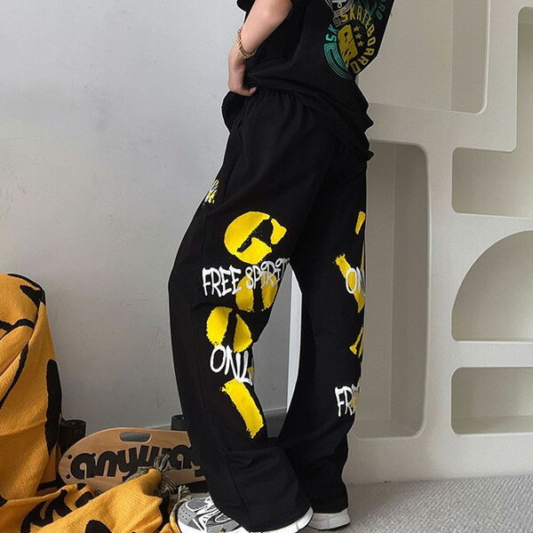 Rakuten - ワイドパンツ ジャージパンツ ロゴプリント バックプリント ビッグロゴ 黒 黄色 ストレッチ ダンス 衣装 ヒップホップ コスチューム 韓国ファッション 大きいサイズ 個性的 派手 パンツ
