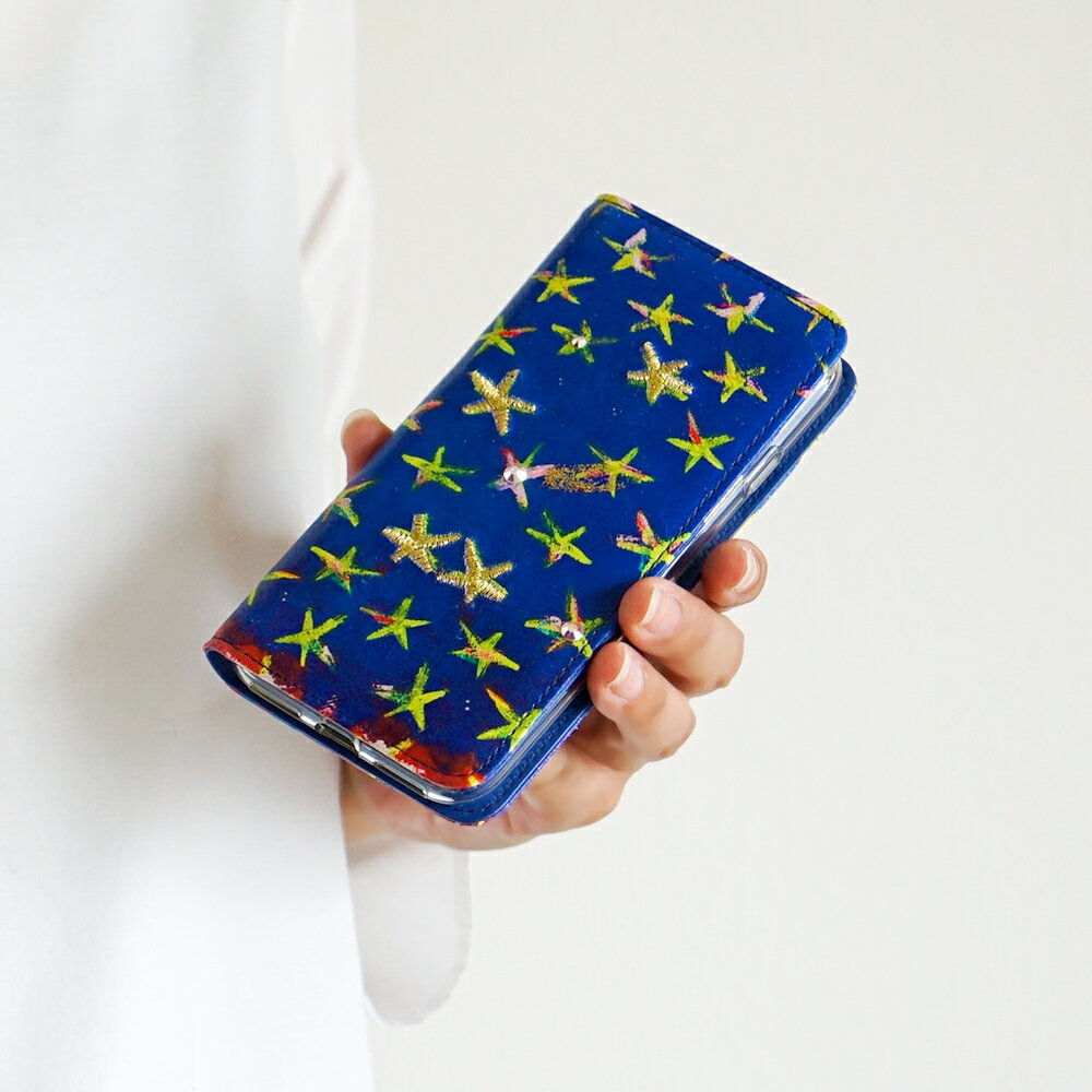 【ノベルティ付＆無料ラッピング】ツモリチサト スマホケース iPhone7 iPhone8 手帳型 エジプシャンスター星 プリント ししゅう ギフト 羊革 本革 tsumori chisato CARRY 59054 プレゼント ギフト 誕生日 記念日