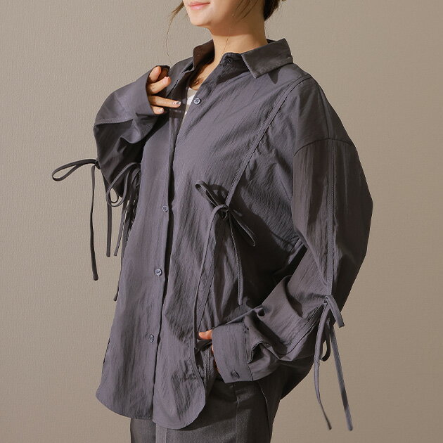 ソリッドカラー ドロスト付き オーバーサイジング 長袖 ブラウス 女性 レディース トップス シャツ 春 夏 秋 単色 無地 羽織り ライトアウター リボン 長さ調節 ゆったり 体型カバー ロング丈 ビッグシルエット 華奢見せ 着まわし スマートのサムネイル