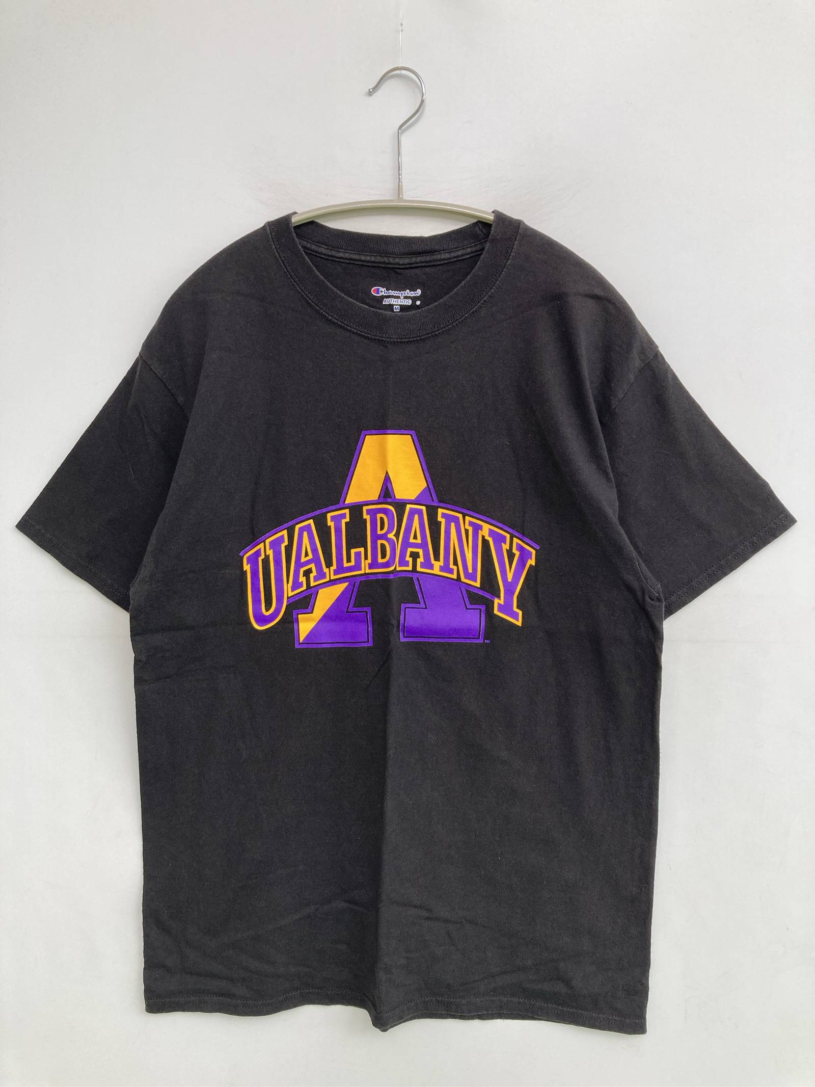 Rakuten - 【中古】Champion チャンピオン Tシャツ/カットソー M ブラック 前面プリント ブランドロゴ ミドル丈 半袖 クルーネック(丸首) メンズ レディース