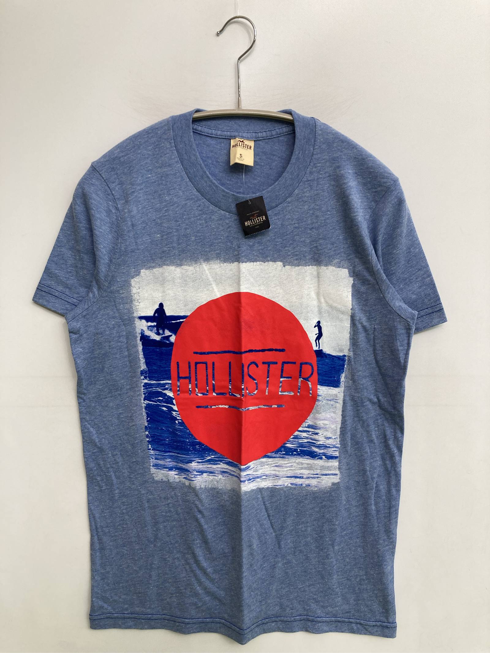 Rakuten - 【中古】HOLLISTER ホリスター Tシャツ/カットソー S ブルー 前面プリント ブランドロゴ ミドル丈 クルーネック(丸首) 半袖 メンズ