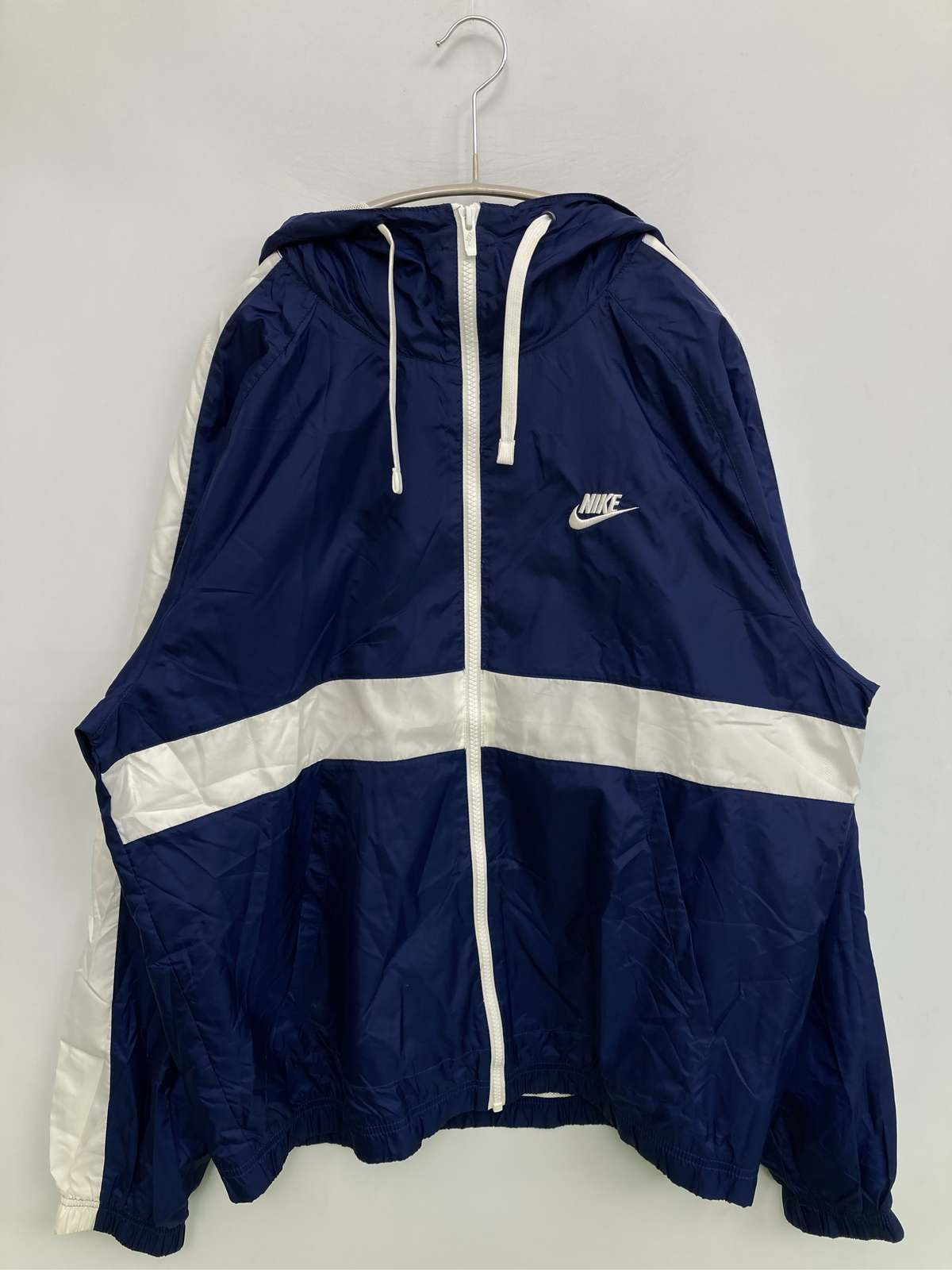 【中古】NIKE ナイキ ナイロンジャケット L ネイビー 無地 ワンポイント ブランドロゴ フードあり メンズ