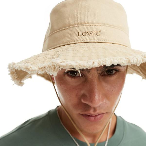 リーバイス Levi's Levi's ロゴ入りクリーム色のバケットハット 帽子 メンズ 男性 インポートブランド