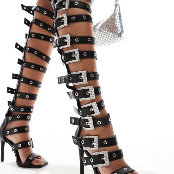 Azalea Wang Harlowe オーバーニーバックルヒールサンダル（ブラック） 靴 レディース 女性 インポートブランド 小さいサイズから大きいサイズまで