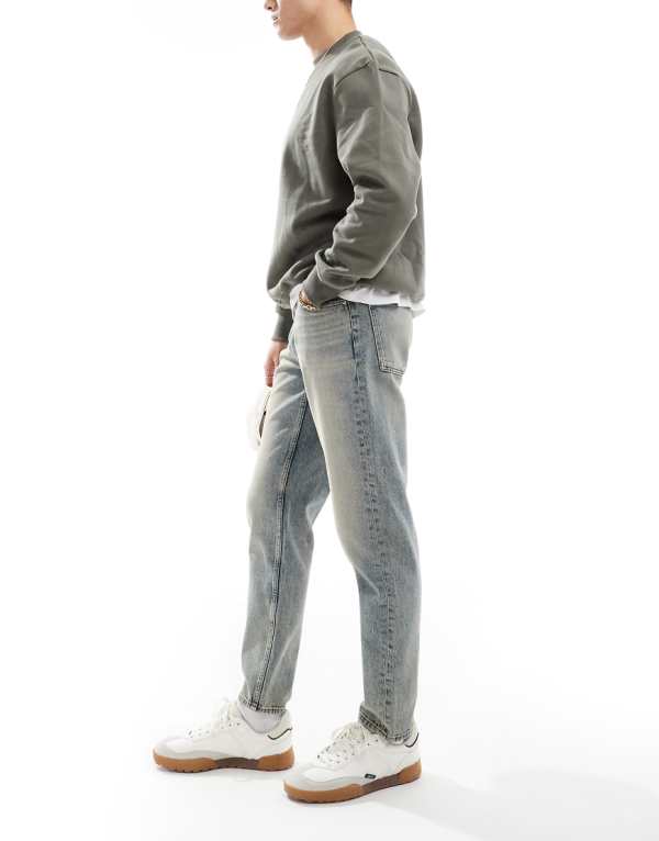 エイソス ASOS asos ASOS DESIGN テーパードフィットジーンズ ライトウォッシュブルー パンツ ボトム メンズ 男性 インポートブランド 小さいサイズから大きいサイズまで