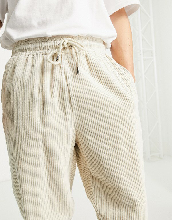 カールカナイ KARL KANI Karl Kani ベージュのカールカニシグネチャーコーデュロイジョガー パンツ ボトム メンズ 男性 インポートブランド 小さいサイズから大きいサイズまで