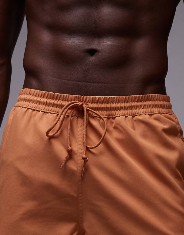 カーハート Carhartt WIP Carhartt Carhartt WIP チェイス スイムショーツ（オレンジ） 水着 メンズ 男性 インポートブランド 小さいサイズから大きいサイズまで