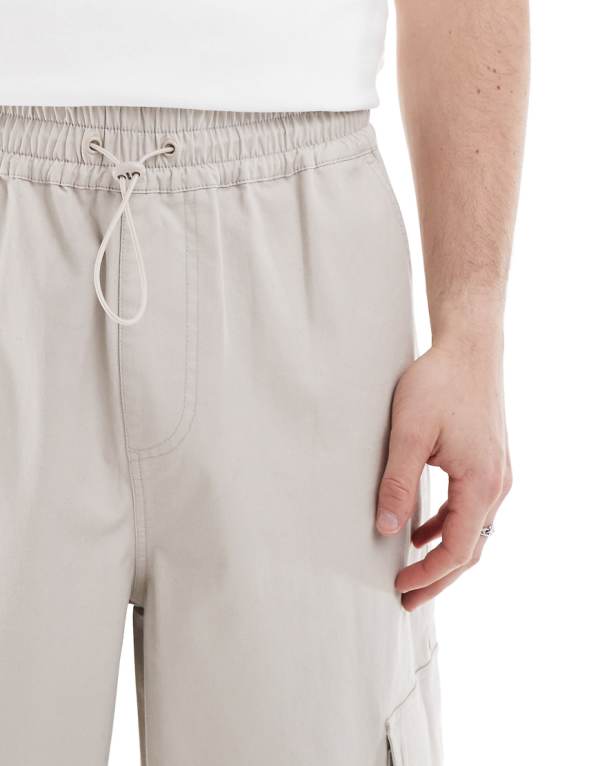 エイソス ASOS asos ASOS DESIGN グレーの伸縮性ウエストのスーパーバギーカーゴパンツ パンツ ボトム メンズ 男性 インポートブランド 小さいサイズから大きいサイズまで