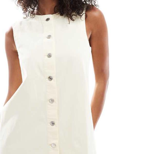 エイソス ASOS asos ASOS DESIGNのボタン開閉式トラペーズデニムミニドレス（淡いイエロー） ワンピース レディース 女性 インポートブランド 小さいサイズから大きいサイズまで