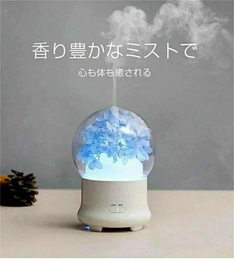 【商品詳細】 ■消費電力： 10W■サイズ： 120*120*168MM■コード長：140cm■主な素材：PP/ABS/生花■連続運転時間：強運転約3時間/弱運転約6時間■タイマー：1時間■発振周波数：2.4MHz■タンク容量： 100ML■電源：DC-12V/1A使い方：付属のコードのプラグを機体ベースのDC電源ポートに差し込みます。反時計方向回転して上部の蓋を取り外します。きれいな常温の水道水を入れます。市販のアロマオイルまたはエッセンシャル（天然）オイルを2〜3滴入れます。時計回り回転して上部の蓋を取り付けます。ボタンをタップして運転開始します。注意※画像はご覧になっているモニターやPCなどの環境により、実物と多少カラーが異なる場合がございます。※ページに記載の通りですが、製造時期や改良などによって仕様が若干異なる場合がございますので何卒ご了承下さい。※基本的には全国一律送料無料と対応させていただきますが、ご送付先は沖縄・北海道など離島の場合は2000円の送料をご請求させていただきます、ご注文後追加送料があります。※色味やサイズが異なるなどのクレームはご対応致しかねますので、ご了承ください。※商品のサイズは採寸方法によって、若干な誤差が生じる場合はあります。ご了承ください。※こちらの対応と商品について何かご不満がありましたら、「レビュー」を付ける前に一度ショップとご連絡してお願いいたします、ショップの誠意を持って最後まで対応させていただきます。品質保証◎※販売している商品は全て新品未使用です、倉庫から出荷前に商品検査必要ですので、商品箱を開封する場合もございます、予めご了承くださいいませ。◎※初期不良の場合は到着後3営業日以内にご連絡ください。◎※初期不良の場合は写真やビデオをご提供下さい、確認後無料で新品交換もしくは御返金致しますのでご連絡下さい。◎※写真やビデオをご提供出来ない場合は技術者と確認できません、返品返金対応出来ない可能性が御座います、予めご了承くださいいませ。