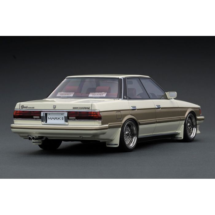 SEARCH WORD：イグニッションモデル 1/18 ミニカー 自動車 模型 完成品 塗装済み コレクション 玩具 おもちゃ インテリア 車 IG Ignitionmodel TKCompany商品概要：「Mark2Grande (GX71) 」を1/18スケールレジンモデルで再現。ボディカラー：パールホワイト/ゴールド。内装色：ベージュ。BBS RSタイプ17インチホイール(ポリッシュ＆シルバー）にローダウン仕様。純正リップスポイラー、デュアルマフラー、ナルディタイプウッドステアリング、TS-X10スピーカーを装着。※画像は試作品です。商品仕様：■メーカー：ティーケー・カンパニー■JANコード：4573448908215■商品名：1/18 Toyota Mark2Grande (GX71) Pearl■型番：IG3821■スケール：1/18■ご注意：※製品の仕様や価格は予告なく変更する場合があります。※掲載している画像は、実際の製品と一部異なる場合があります。※製品のパッケージ（外箱やスリーブ等）は本体を保護する目的となり、運搬におけるダメージについては不良交換の対象外となります。※新製品は発売日が変動する場合があります。※商品概要、仕様、サービス内容及び企業情報などは商品発表時点のものです。※最新の情報に関しましては、メーカーサイトをご覧ください。※発売前予約商品についてはメーカーの商品製造数により納期が遅れる場合やご注文キャンセルをお願いする場合がございます。