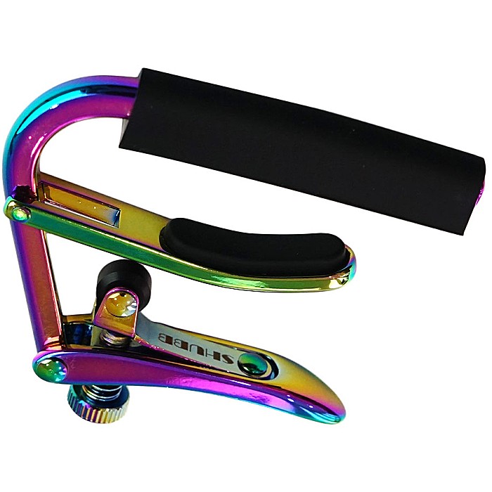 神秘的な光沢を放つ真珠のような輝きをもつ Paua Pearlシリーズ。SHUBBの持つ確かな技術と今までにない輝きをプラスでプレイヤーにお届けいたします。 トップブランドとして培ったノウハウにより、確立された独自の取付レバーデザインは、調整スクリューにより楽器のネックに合わせてワンタッチでスムーズな取り付けが可能。レバー内のローラーパーツによりスムーズな動作と、プレイヤーの指先と同様の最適な力を弦へと伝えます。 アコースティックギターなどの指板が緩やかな湾曲（アール）の有るギター向け。