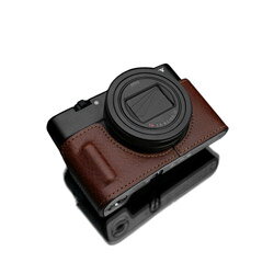 人気の最新高級コンパクトデジタルカメラ、SONY RX100 VI用本革カメラケース。ハイクオリティーなデザインがボディにマッチ。ケース底面にはロゴが刻印されています。ケース底面のネジをカメラの三脚穴に固定。カメラとケースをしっかり固定できます。ケースを装着したまま三脚の取付ができます■仕様・対応機種：SONY RX100 VI（DSC-RX100M6）・カラー：ブラウン人気の最新高級コンパクトデジタルカメラ、SONY RX100 VI用本革カメラケース
