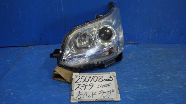 【中古】中古部品 ステラ LA100F 左ヘッドランプ 【3330340100-250708000510900】