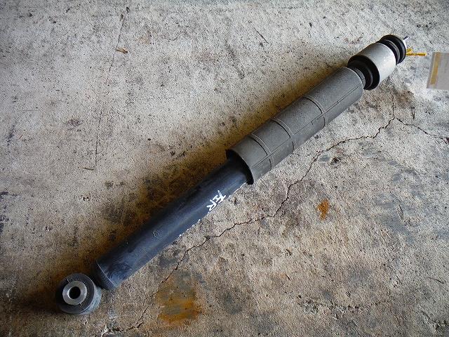 【中古】中古部品 ティーダ ラティオ SC11 左リアショックアブソーバー 【3340140100-001238460750800】