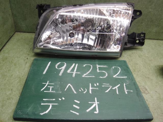 【中古】中古部品 デミオ DW3W 左ヘッドランプ 【3310120100-001648060110900】