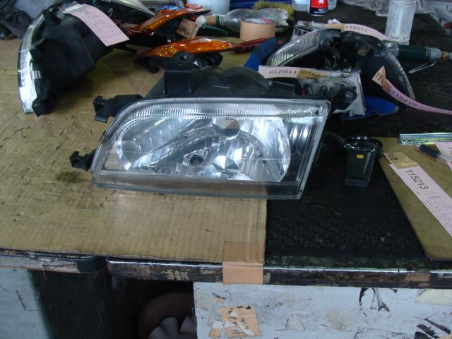 【中古】中古部品 コルサ EL51 左ヘッドランプ 【3340220100-000766567910900】