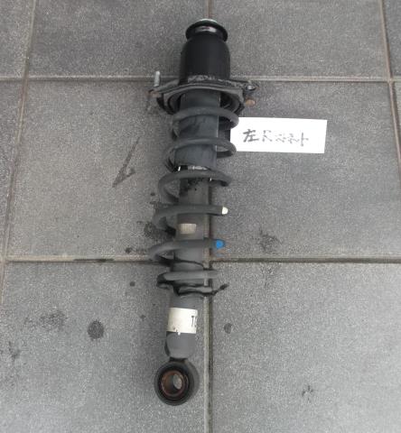【中古】中古部品 カローラフィールダー NZE141G 左リアストラット 【3310010100-250321500450410】