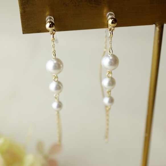 《マラソン限定クーポン進呈中》【イヤリング(樹脂ノンホールピアス)】連なるパールのウェーブアメリカンピアス風イヤリング 金属アレルギー対応 大人可愛い 樹脂ノンホール イヤリング パーツ 金具 ピアスみたい イヤリング プレゼント パール