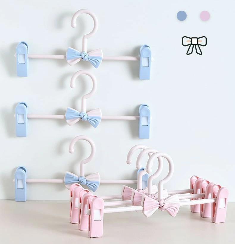 衣類 衣類収納 すっきり 整頓 洗濯 物干し 日用品雑貨 片づけ クローゼット 整理 ズボンハンガー 長さ調節可 6本セット 伸縮設計 省スペース リボン パンツハンガー