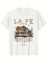 200gのコットン製Tシャツで、背景には夕日、手前には山と木々が描かれた山の風景。上部と下部にそれぞれ茶色の文字、下部中央にテキストを配し、宗教と自然探索をテーマにしたデザイン。
