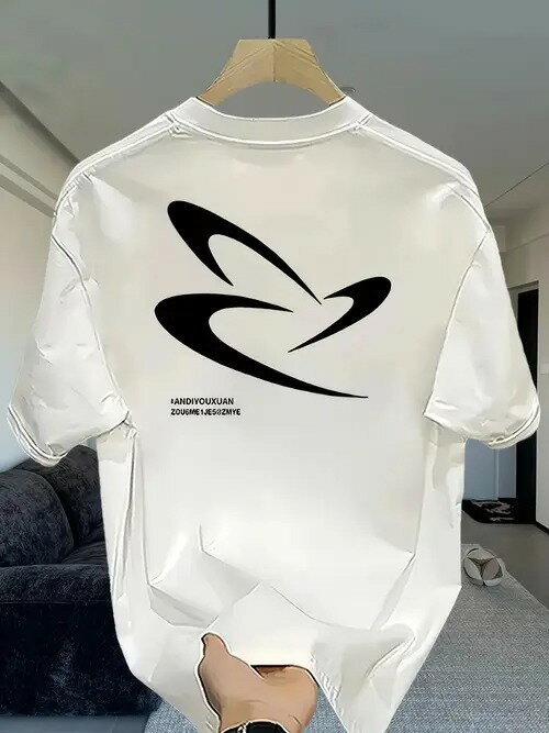 背中に黒の抽象柄、柄の下に英字が入った200gの白の丸首半袖Tシャツ。ピュア・コットンで着心地がよく、通気性に優れ、男女兼用のルーズフィット。
