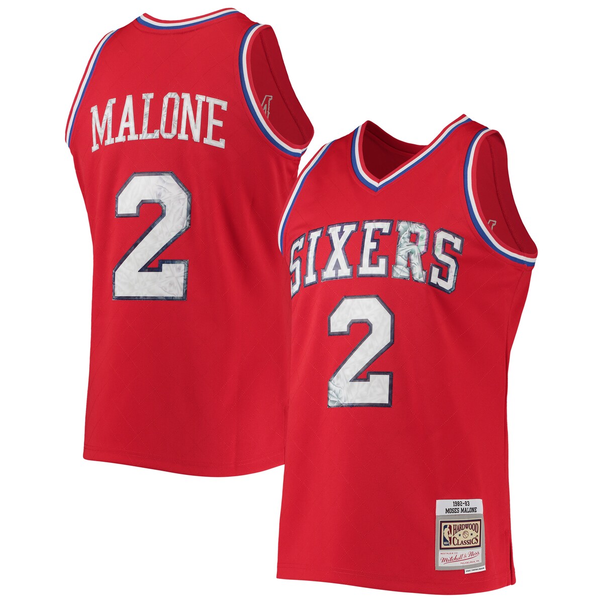 For the NBA's 75th anniversary, throw it back to one of the stars of the Philadelphia 76ers with this Moses Malone Hardwood Classics Diamond Swingman jersey from Mitchell & Ness. It features faux diamond details for the league's big milestone and that old-school design Moses Malone used to wear back in the day. This authentic piece of gear is a great way to mesh past and present as you get fired up for game day.Material: 100% PolyesterMachine wash, line drySwingman ThrowbackWoven jock tag at hemBrand: Mitchell & NessStitched designImportedStitched holographic applique with faux diamond patternStraight hemline with side splitsOfficially licensedSleeveless