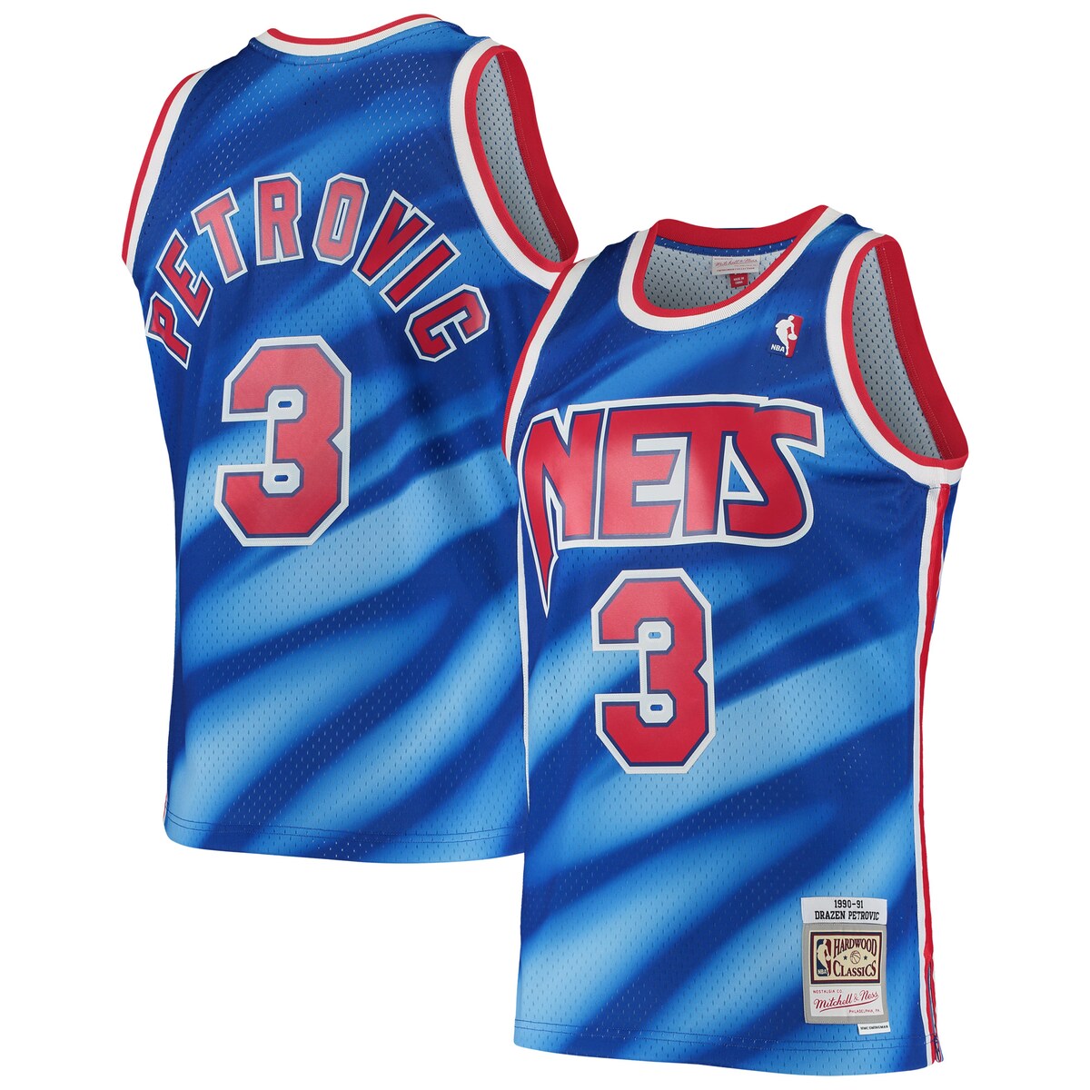 Rep one of your all-time favorite pros with this Drazen Petrovic Swingman jersey from Mitchell & Ness. The throwback New Jersey Nets details are inspired by the franchise's iconic look of days gone by. Every stitch on this jersey is tailored to exact team specifications, delivering outstanding quality and a premium feel.Tackle twill graphicsOfficially licensedMaterial: 100% PolyesterHeat-sealed NBA logoRib-knit collar and arm openingsImportedCrew neckSwingman ThrowbackBrand: Mitchell & NessWoven tag with player detailsWoven jock tagMesh fabricSide splits at waist hemSleevelessMachine wash, line dry