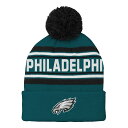 Prevent cold weather from freezing up team spirit by grabbing this Philadelphia Eagles Jacquard cuffed hat. Its knit design features stripes in colors that coordinate with the embroidered Philadelphia Eagles logo and fluffy pom. The stretch fit creates a snug feel and cozy warmth.Pom on topBrand: OuterstuffImportedCuffed knit hatHand wash, dry flatOfficially licensedCuffedMaterial: 100% AcrylicEmbroidered fabric appliqueOne size fits mostKnit graphics